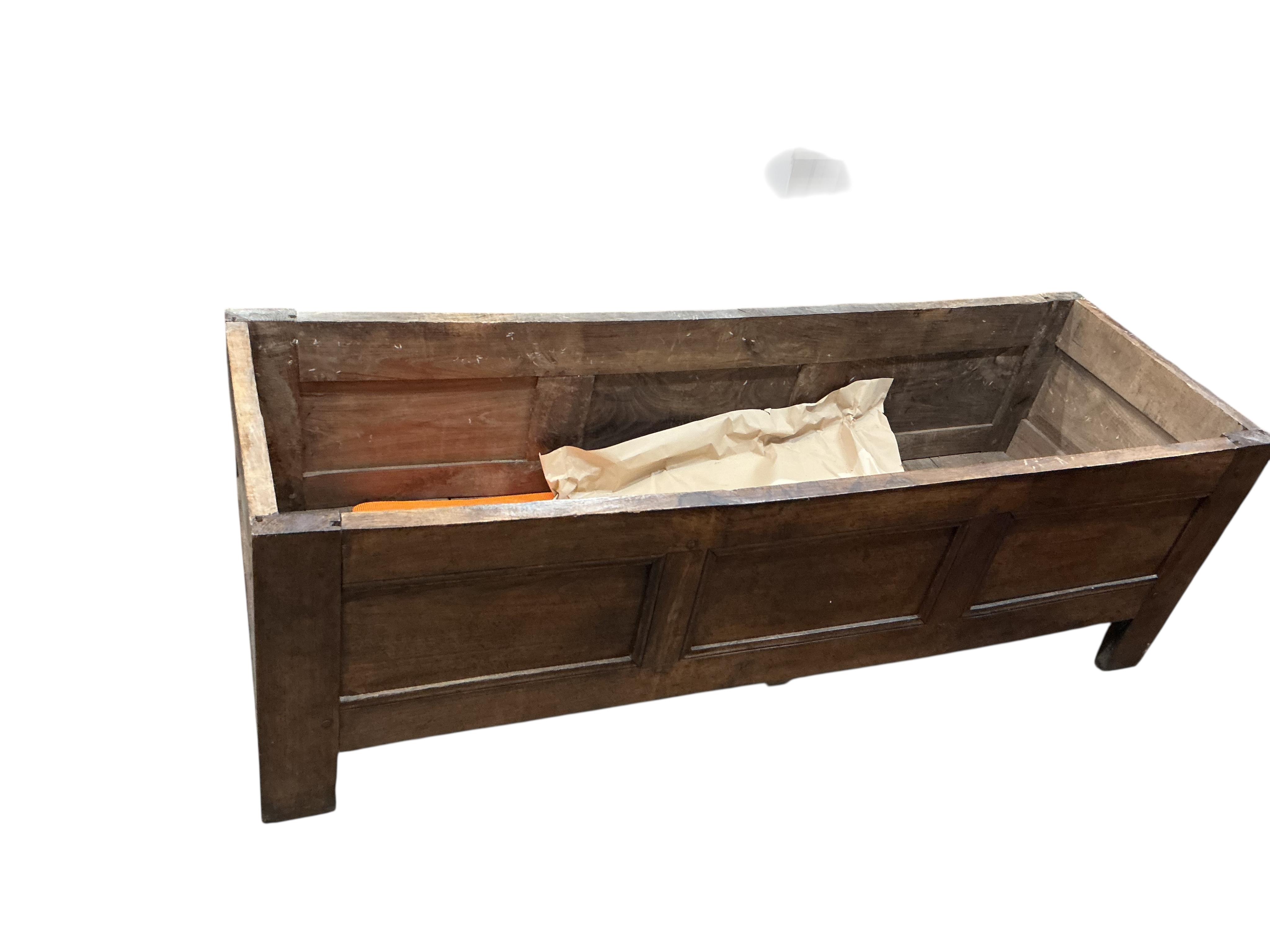 An 18th century Continental oak coffer, width 172cm, depth 53cm, height 53cm